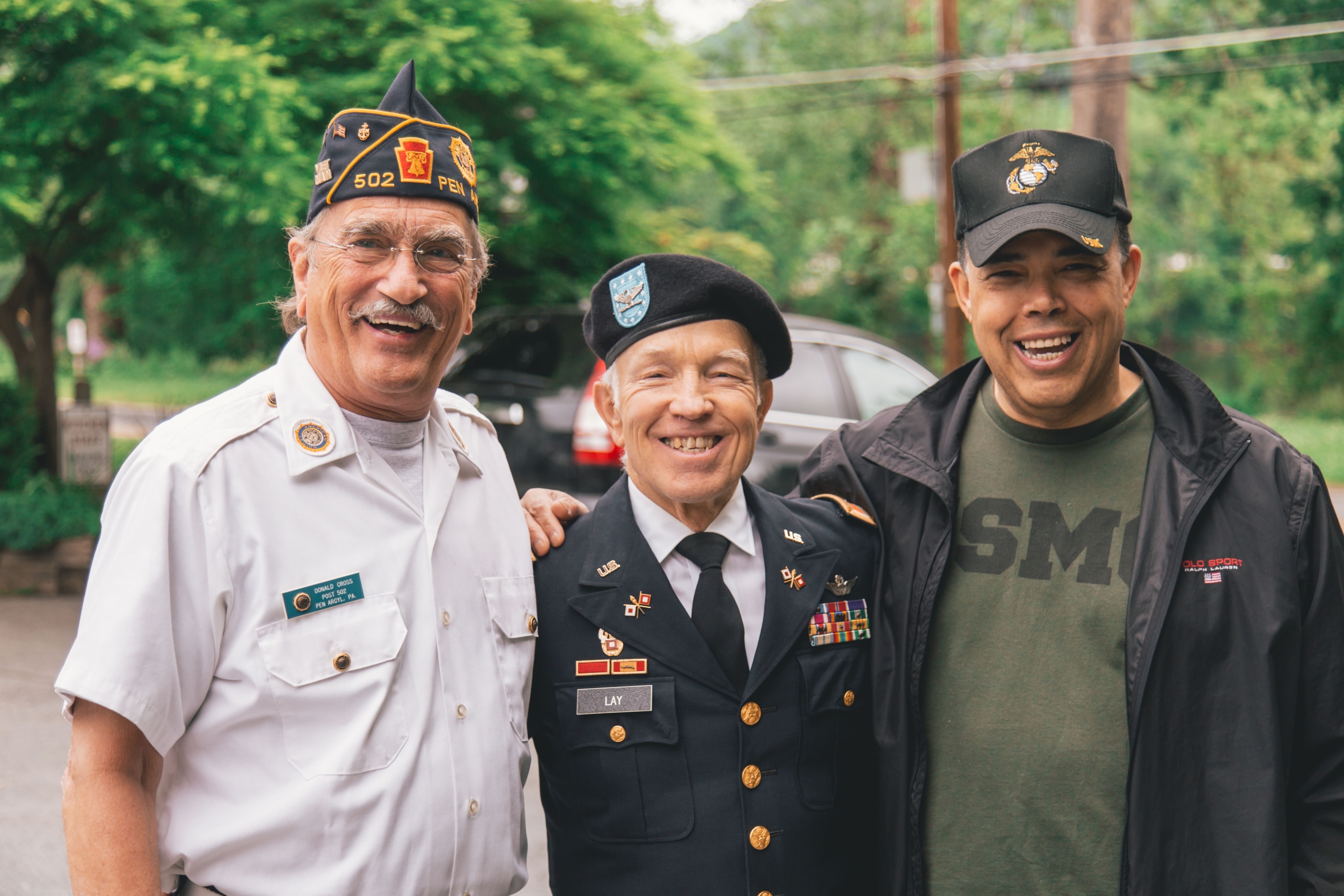 three elderly war veterans